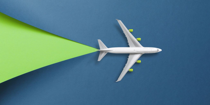 aircraft over blue and green background